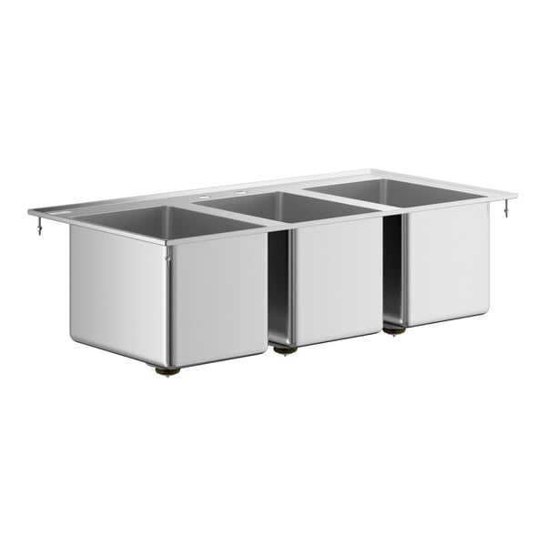 A stainless steel Regency drop-in sink with three compartments.