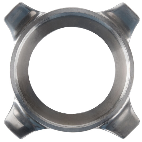 An Avantco metal retaining ring with three handles and a hole in the center.