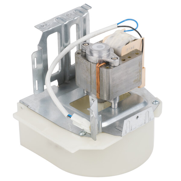 A small white box with a metal fan and wires.