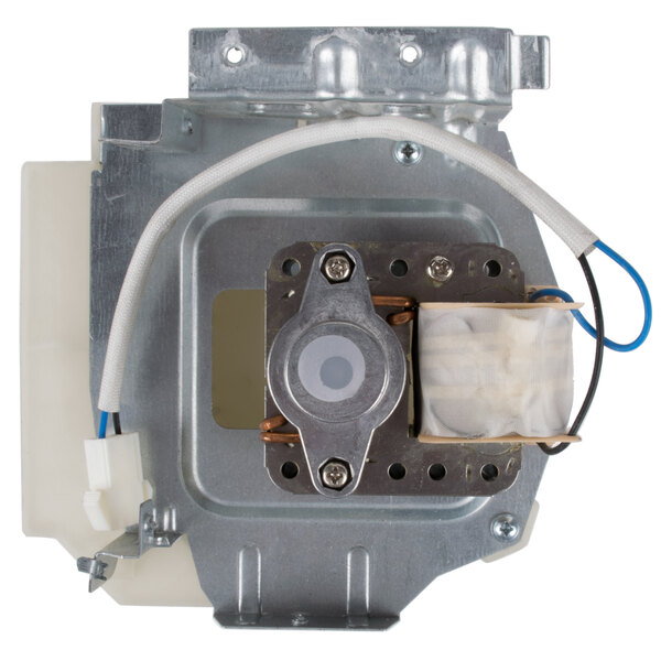 A metal device with a white wire attached.