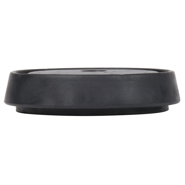 A black plastic round object with a hole in the middle.