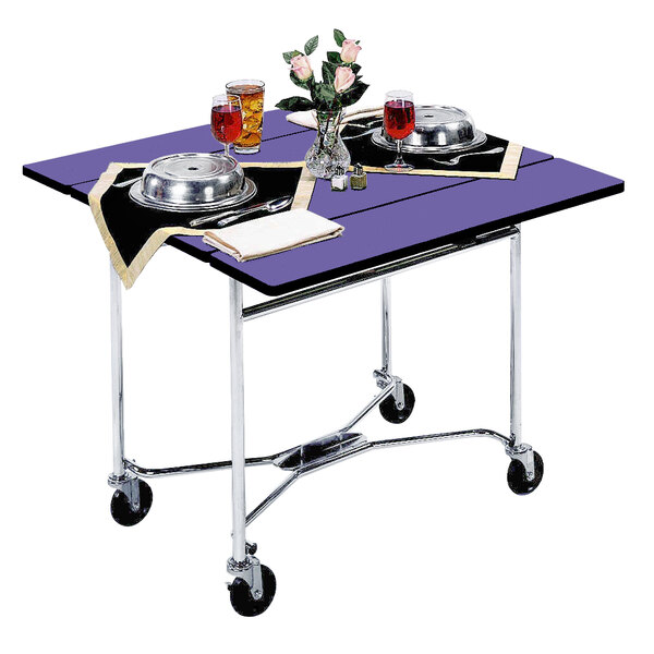 A Lakeside purple room service table with food and drinks on it.