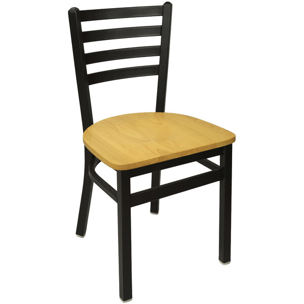 A black metal restaurant chair with a wooden seat and ladder back.