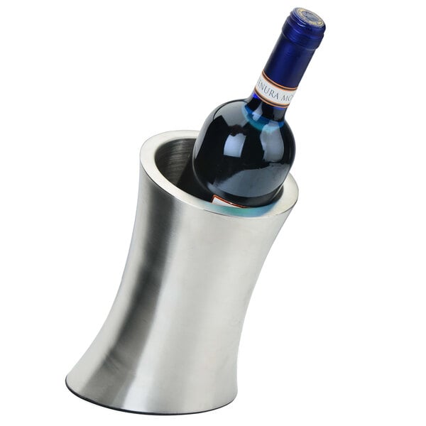 A stainless steel wine bottle holder with two walls at an angle holding a bottle of wine.