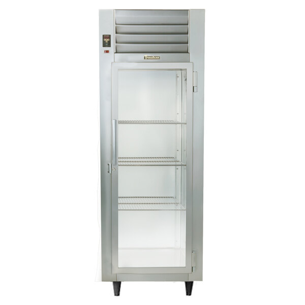 A Traulsen stainless steel single section pass-through heated holding cabinet with glass doors.