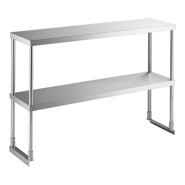 A two-tier stainless steel shelf unit with four vertical supports and a rectangular design.