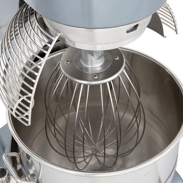 An Avantco mixer with a wire whip inside.