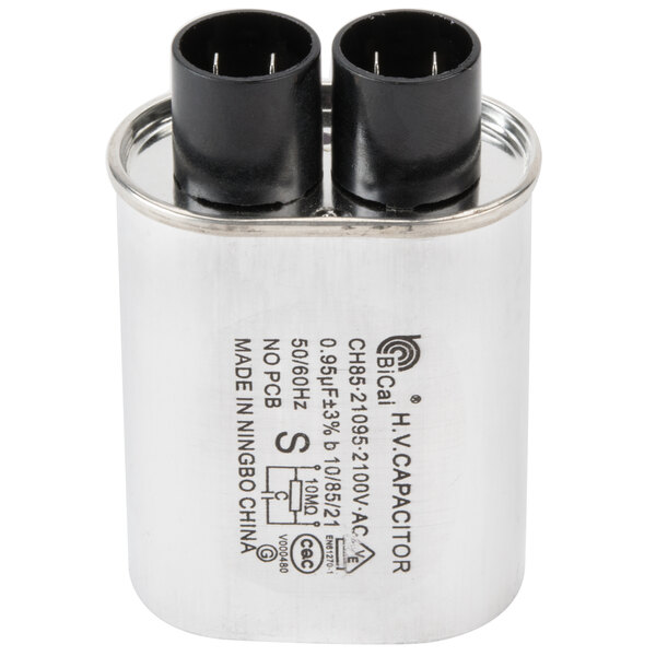 A close-up of a Solwave capacitor with black and white text.