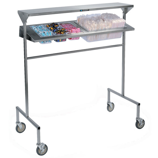 A Lakeside stainless steel mobile station for pans on a metal cart.