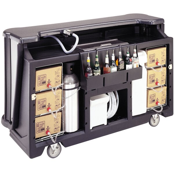A black Cambro Bag in Box cart with bottles and boxes on it.