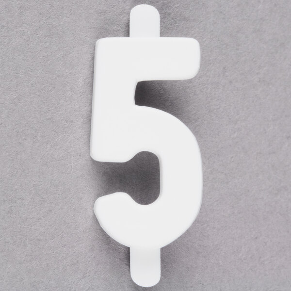 A white molded plastic number 5 deli tag insert.