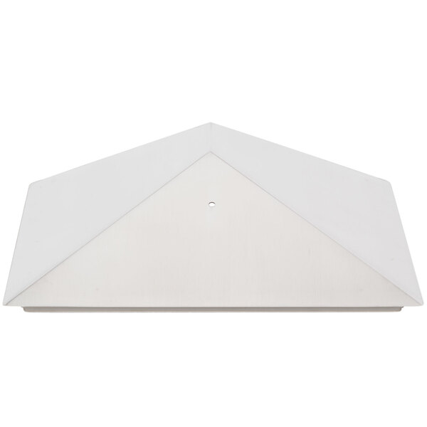 A white triangular cover with a hole in the middle.
