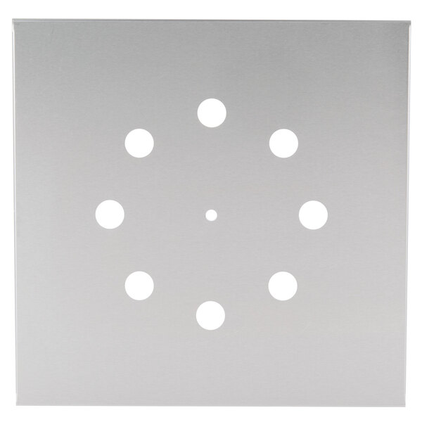 A white square metal plate with many holes in it.