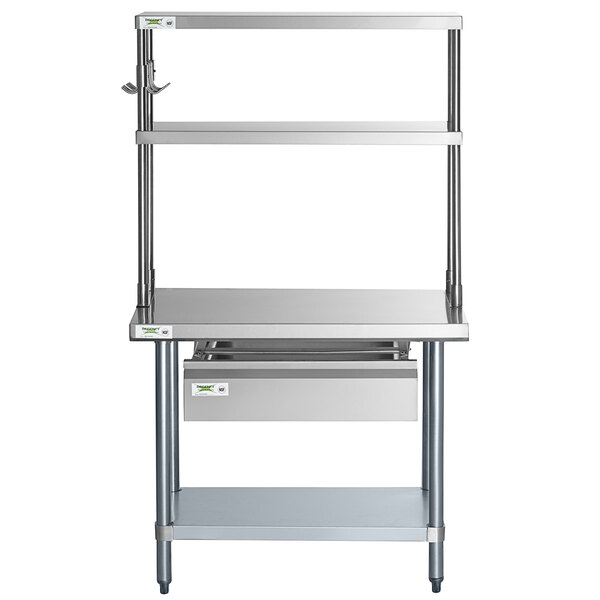 A Regency stainless steel double deck overshelf on a stainless steel work table.