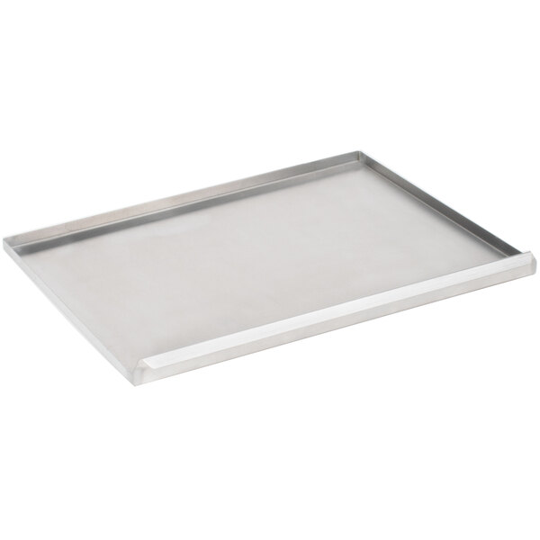 An Avantco stainless steel drip tray on a counter.