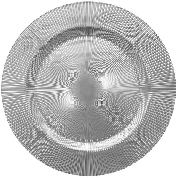 A silver Charge It by Jay glass charger plate with a circular pattern.