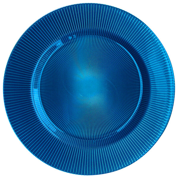 A cobalt blue Charge It by Jay glass charger plate with circular lines.
