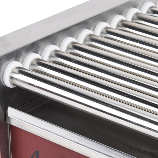 An Avantco outer roller bearing for a stainless steel hot dog roller grill.