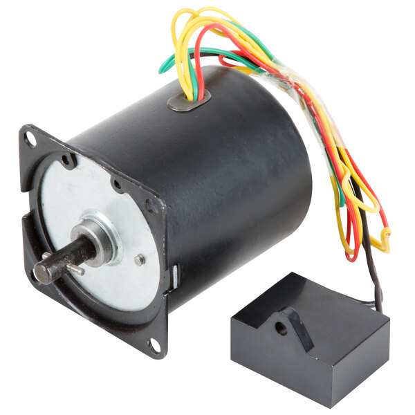 A small black electric motor with colorful wires.
