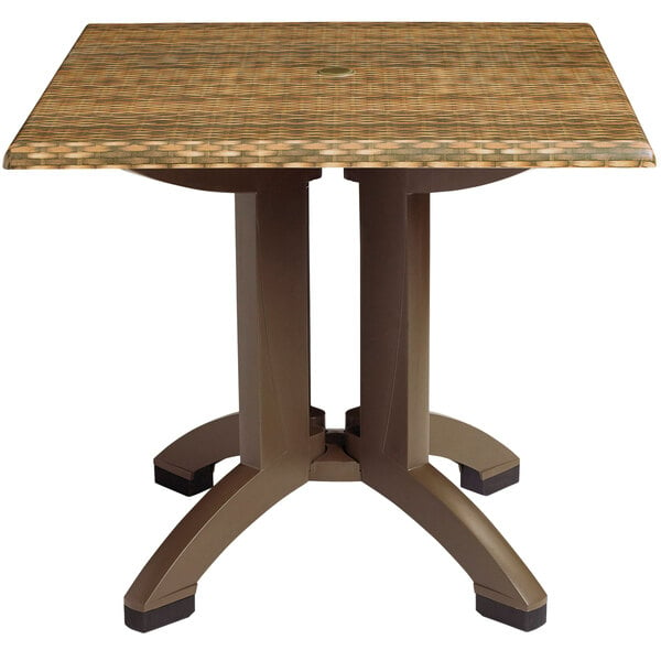 A brown square Grosfillex table with black legs.
