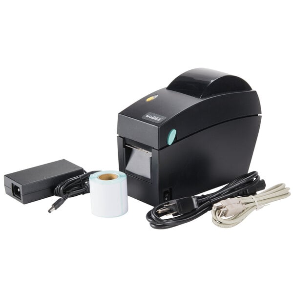 A black Tor Rey DT-2 label printer on a counter with a roll of paper.