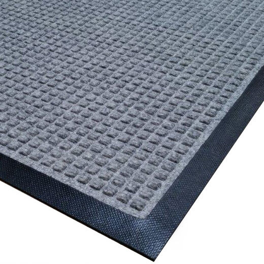A close-up of a grey and black Cactus Mat with black trim.