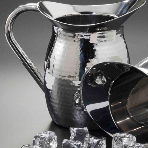An American Metalcraft silver double walled bell pitcher with a hammered finish and a handle.