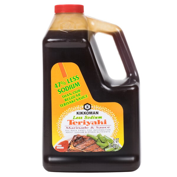 A black plastic bottle of Kikkoman Less Sodium Teriyaki Marinade and Sauce with a yellow label.