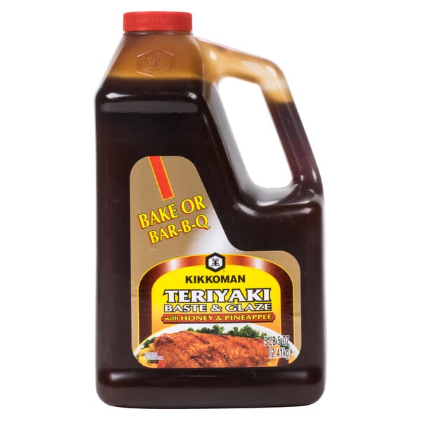 A jug of brown Kikkoman Teriyaki sauce with a white label.