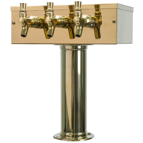 A Micro Matic brass "T" style tap tower with three gold faucets.