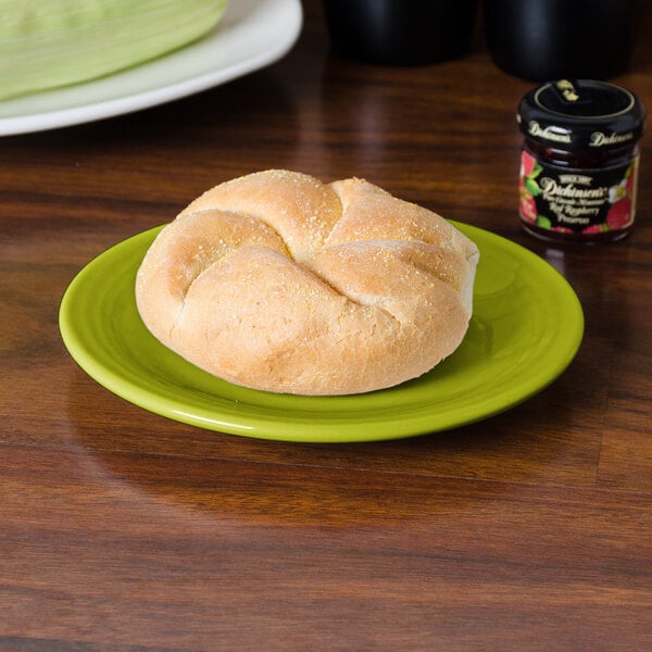 A roll on a Fiesta lemongrass bread and butter plate.