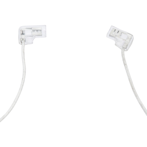 A close-up of a white heating element with a cable attached.