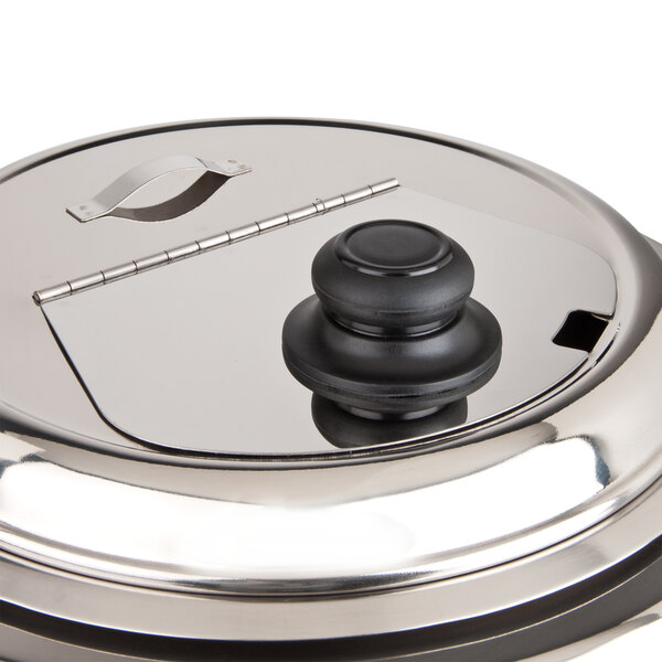 A stainless steel Avantco soup kettle lid with a black knob on a metal handle.