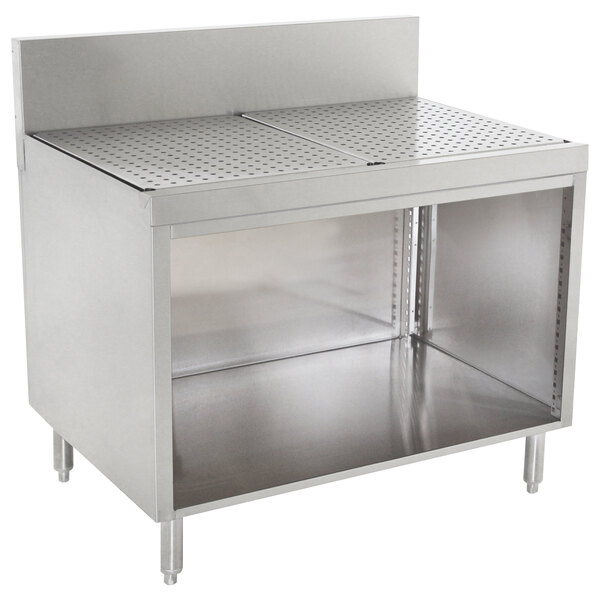 An Advance Tabco stainless steel drainboard cabinet with a shelf.