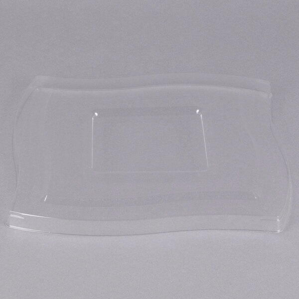 A clear plastic lid with a square shape over a clear plastic container.