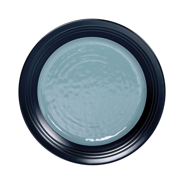 An Elite Global Solutions Durango two-tone melamine plate with a blue center and black rim.