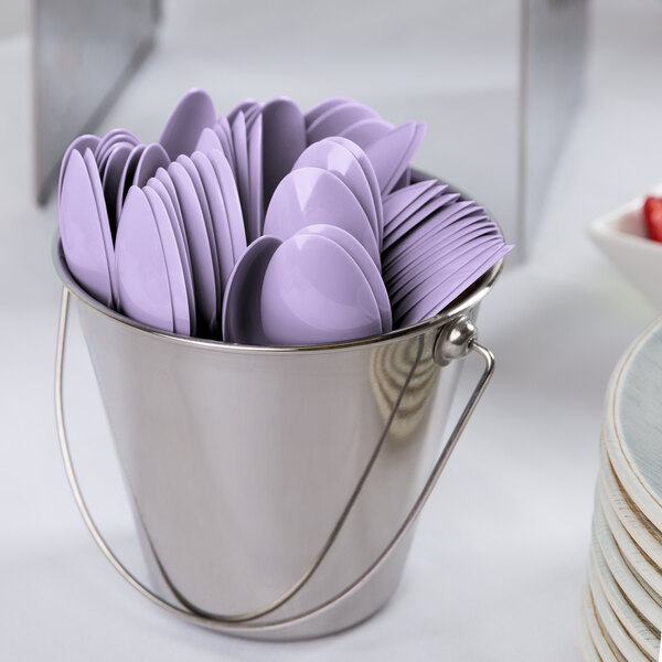 A bucket of purple spoons.