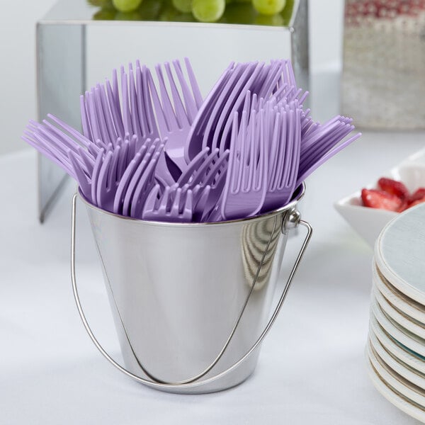 A bucket of Creative Converting luscious lavender purple plastic forks.