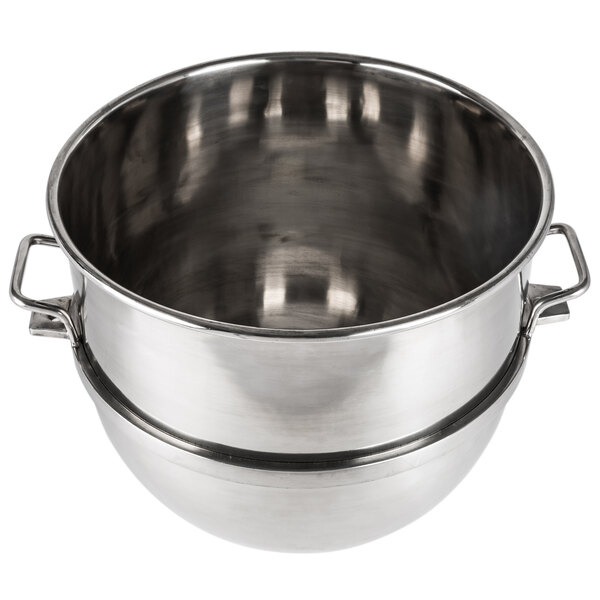 A stainless steel Vollrath mixing bowl with two handles.