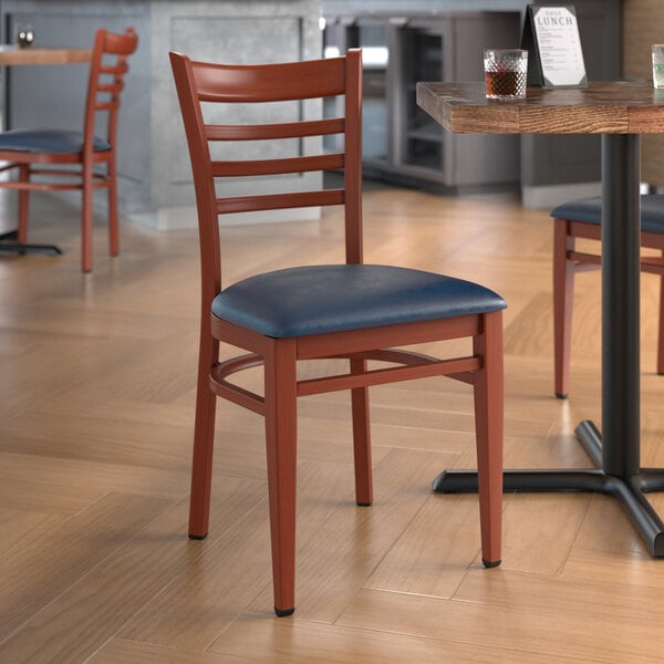 Lancaster Table & Seating Spartan Series Metal Ladder Back Chair with Mahogany Wood Grain Finish and Navy Vinyl Seat - Detached Seat