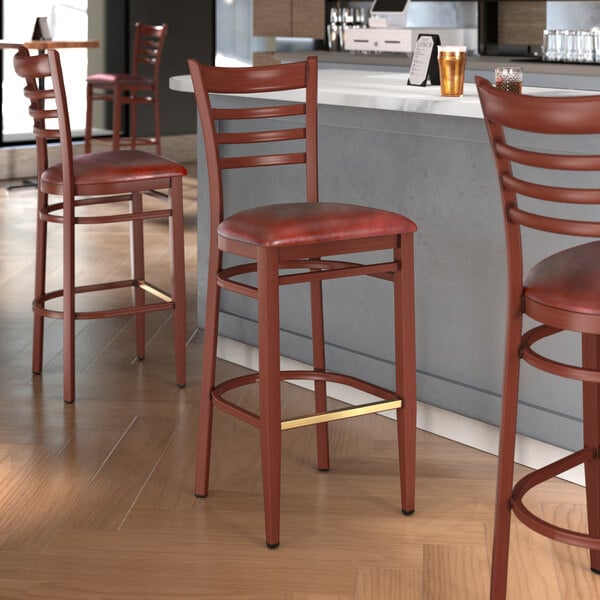 Lancaster Table & Seating Spartan Series Metal Ladder Back Bar Stool with Mahogany Wood Grain Finish and Burgundy Vinyl Seat - Detached Seat