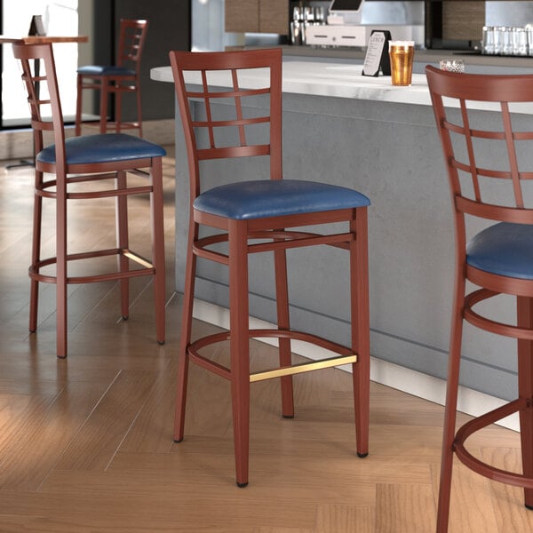 Lancaster Table & Seating Spartan Series Metal Window Back Bar Stool with Mahogany Wood Grain Finish and Navy Vinyl Seat - Detached Seat