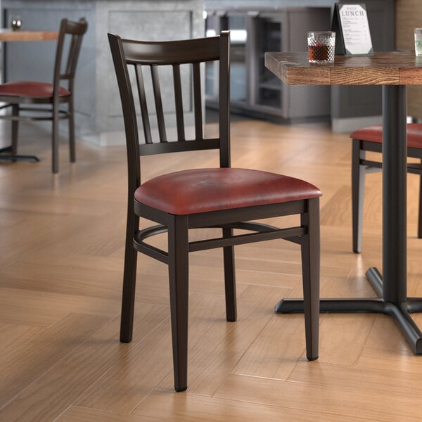 Lancaster Table & Seating Spartan Series Metal Slat Back Chair with Dark Walnut Wood Grain Finish and Burgundy Vinyl Seat - Assembled