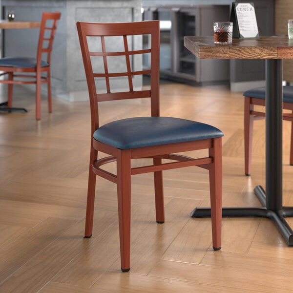 Lancaster Table & Seating Spartan Series Metal Window Back Chair with Mahogany Wood Grain Finish and Navy Vinyl Seat