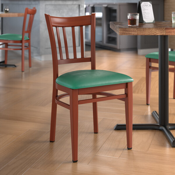 Lancaster Table & Seating Spartan Series Metal Slat Back Chair with Mahogany Wood Grain Finish and Green Vinyl Seat - Detached Seat