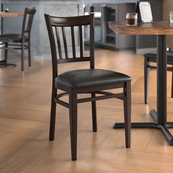 Lancaster Table & Seating Spartan Series Metal Slat Back Chair with Dark Walnut Wood Grain Finish and Black Vinyl Seat - Detached Seat