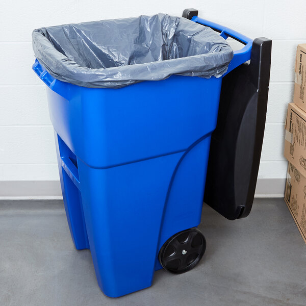 A blue Rubbermaid rectangular trash can with a black handle and lid.