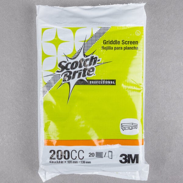 A package of 3M Scotch-Brite yellow and orange griddle screens.