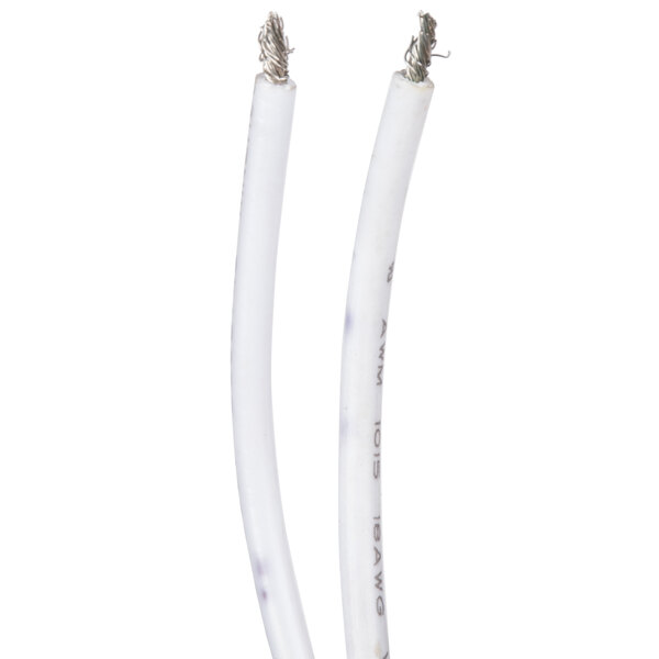 A close-up of an Avantco motor start capacitor with two white cables.