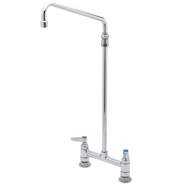 A chrome T&S deck-mounted faucet with two silver levers and a long metal pole with a white cover.